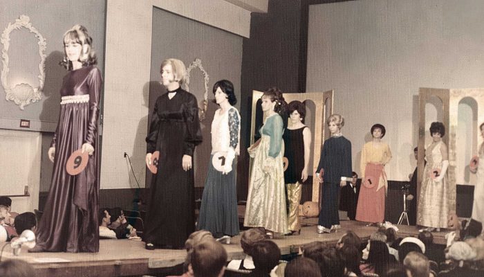 Contestants on stage in evening gowns at the 1969 Miss Memphis Review